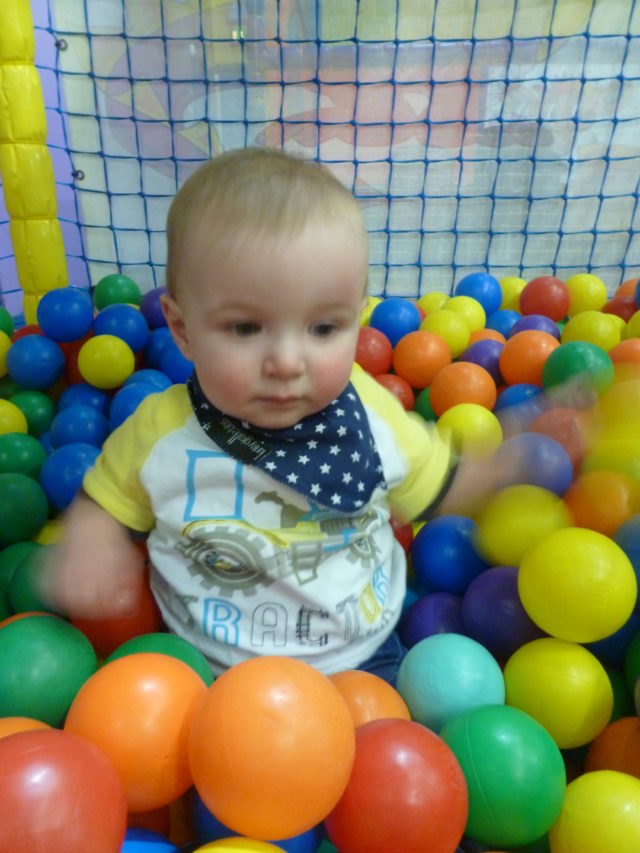 playing in a ballpit at magicland