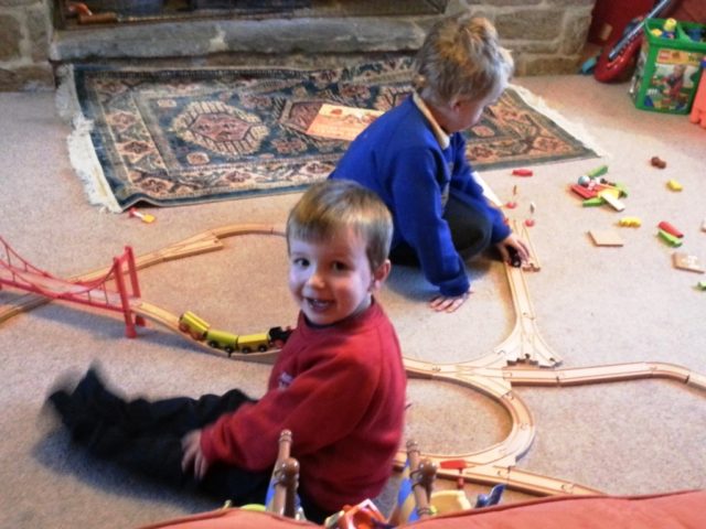 cousins playing trains together