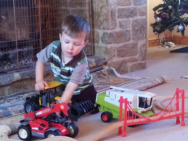 playing with bruder tractors.