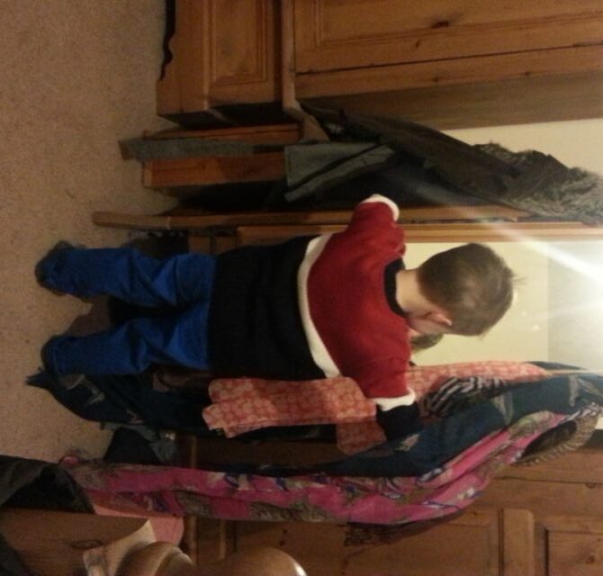 boy looking in mirror