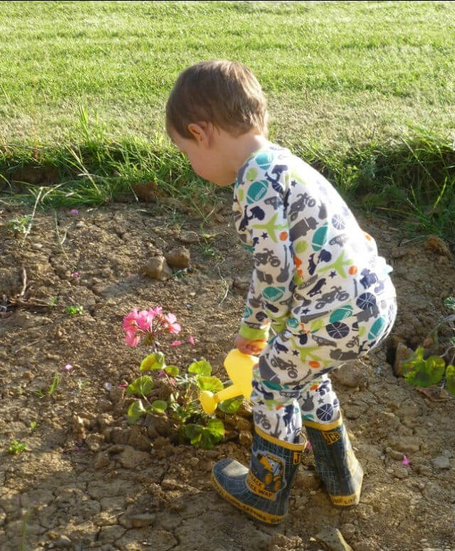 watering flowers in pjs