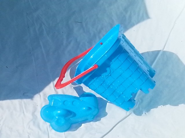 bucket in paddling pool