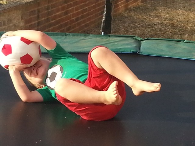 playing ball on the trampoline