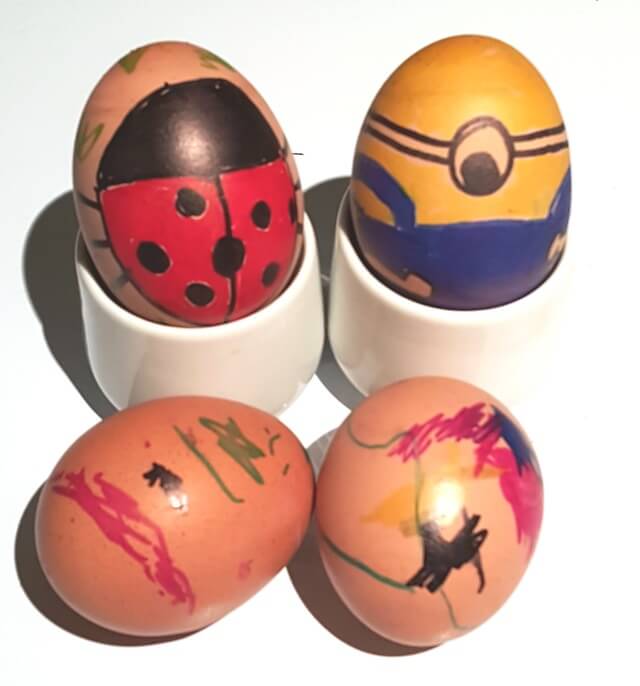 easter egg roll competition eggs - minion egg and ladybird egg