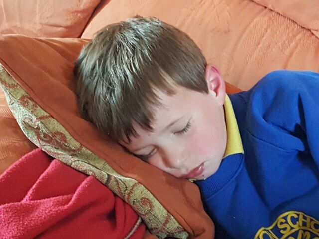 headache sleeping boy
