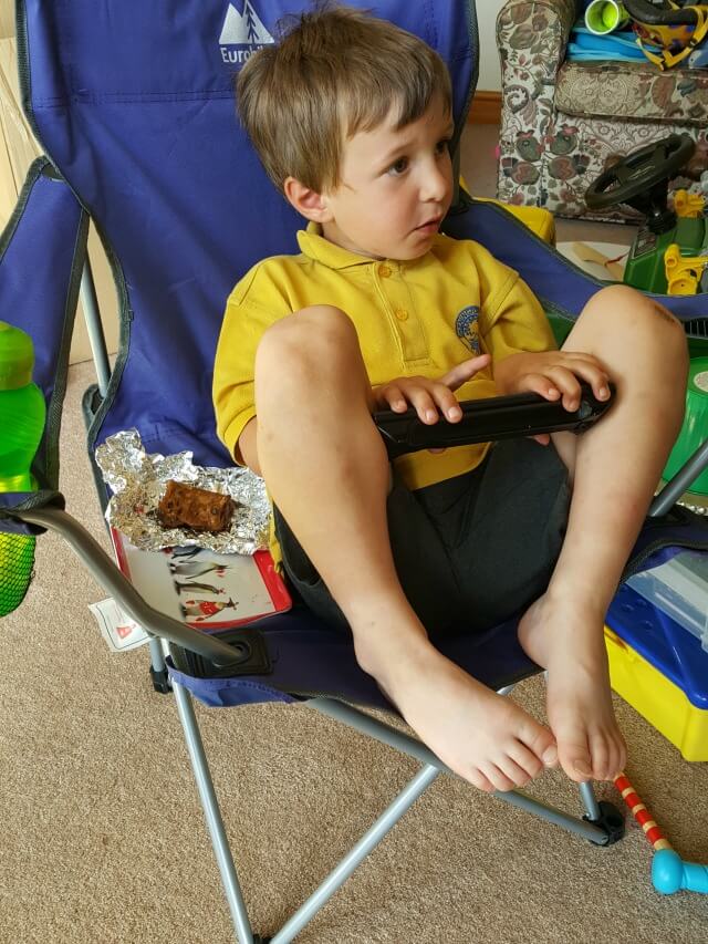 chilling out on his Eurohike camping chair