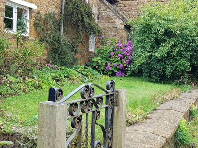 pretty cottage gate and garden