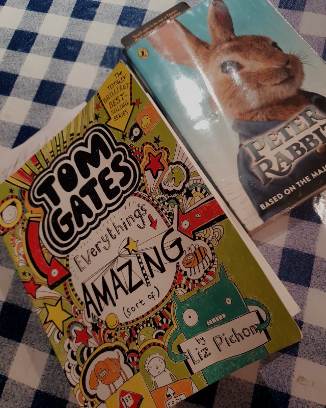 reading books tom gates and peter rabbit