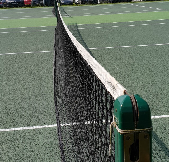 team tennis matches and a tennis net