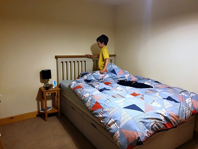 new ottoman bed with wooden headboard