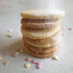 falling icing sugar onto cookies
