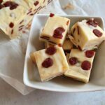 strawberry and cream fudge in bowl and slab