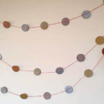 wooden circle garland hung up on the wall