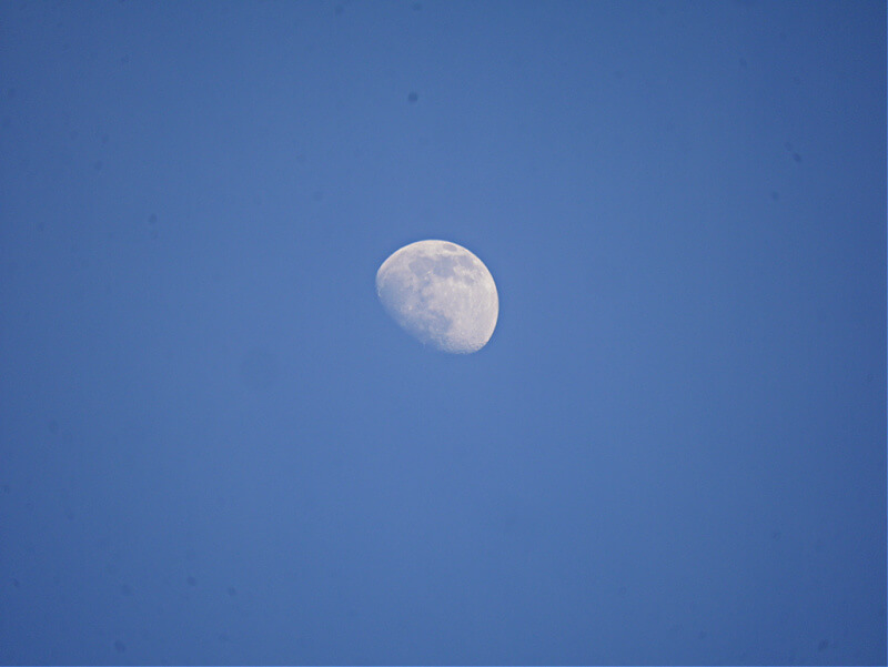moon against blue sky