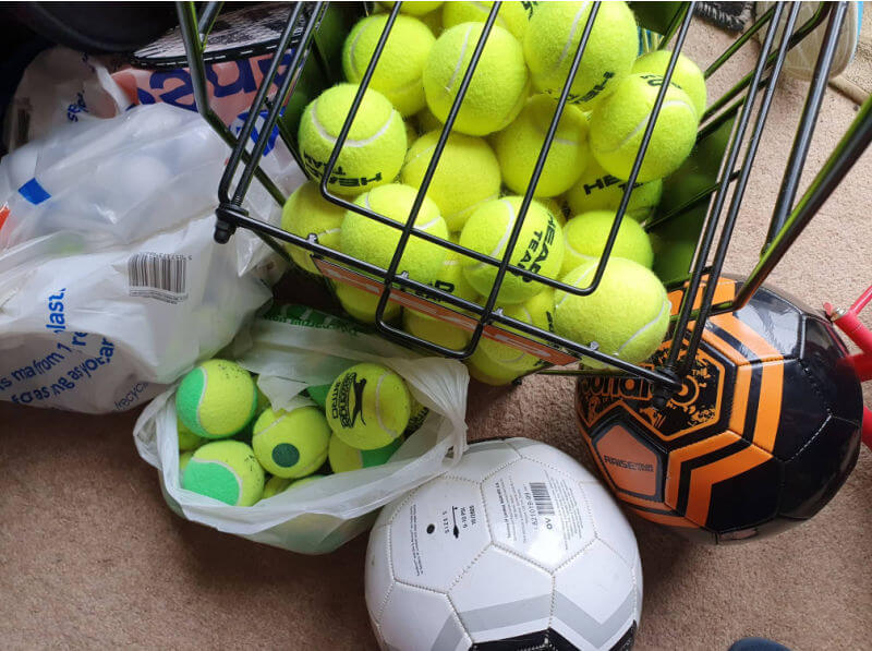 tennnis balls and footballs