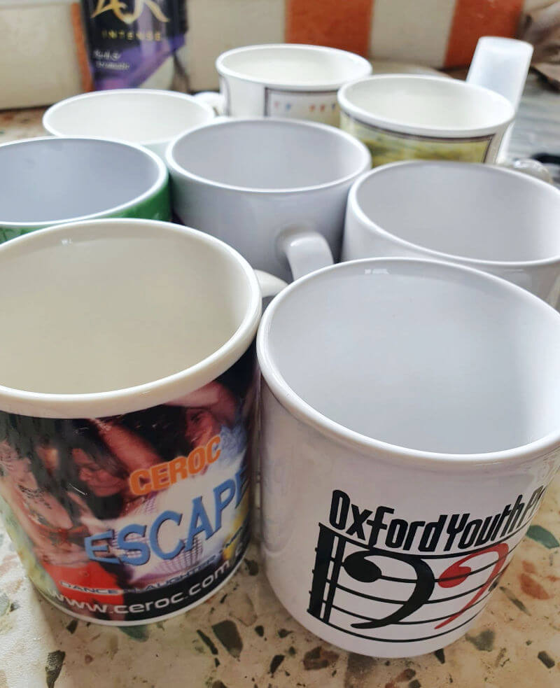 group of mugs looking across the top of them