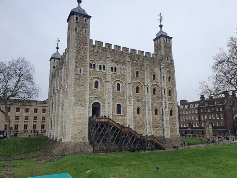 white tower at tower of london with wooden staircase to the door