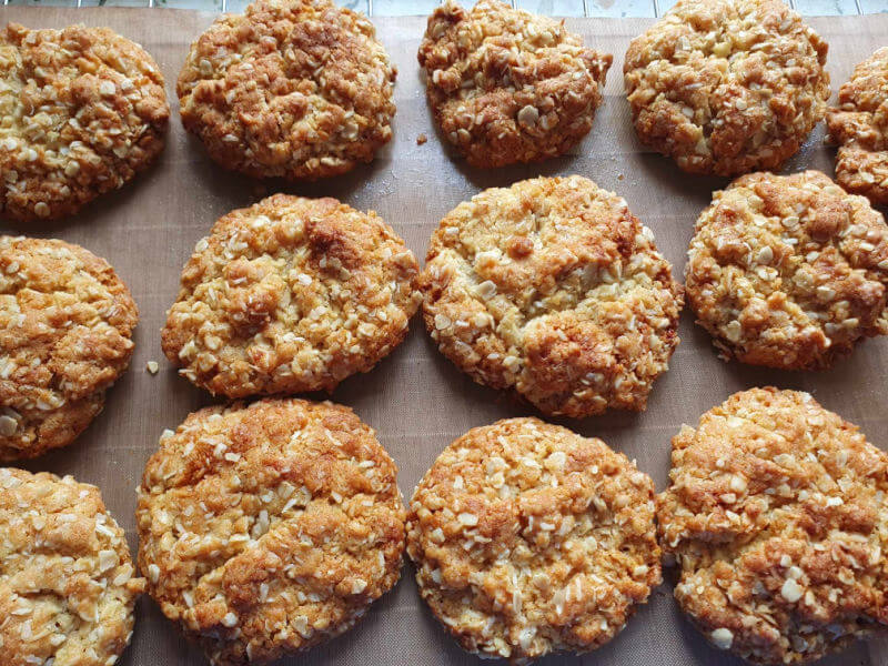 anzac biscuits just cooked lined up