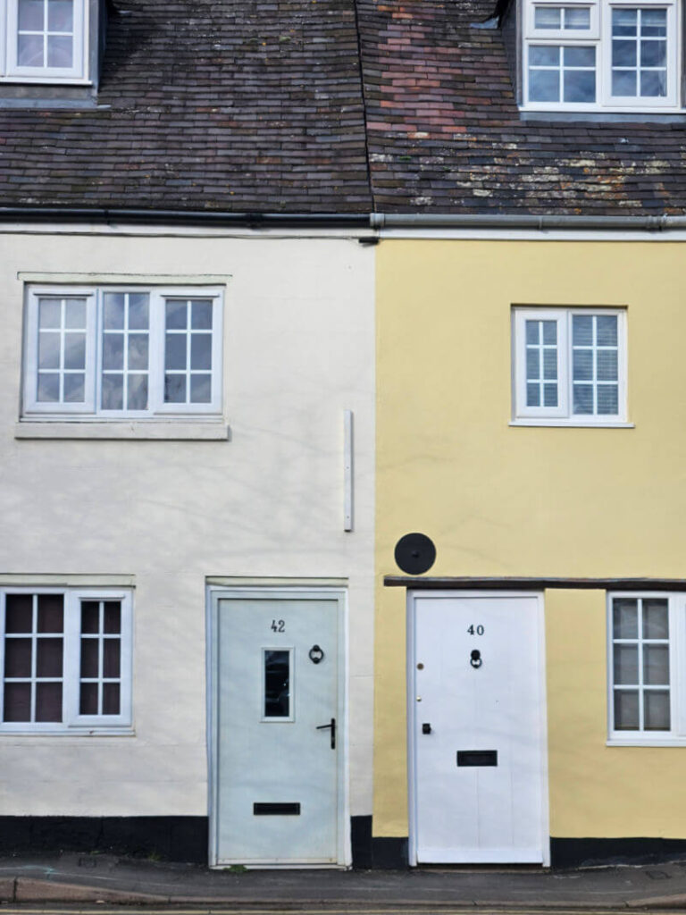 2 yellow terraced houses