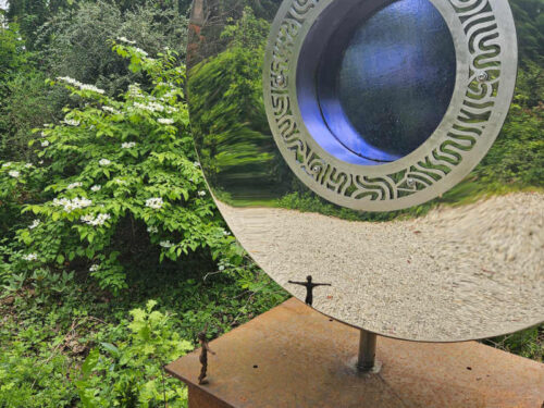 blue circular sculpture on plinth